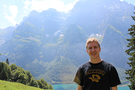 Andrew Allee in front of mountains