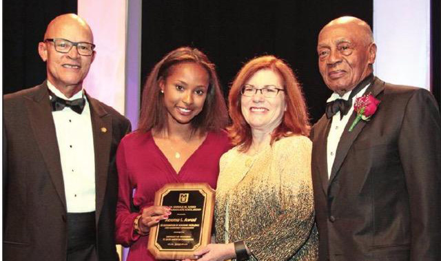 Reema Awad, UM System Interim President Michael Middleton, MU Provost Garnett Stokes, and Dr. Donald Suggs