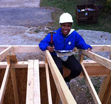 Tia Paulette building a house.